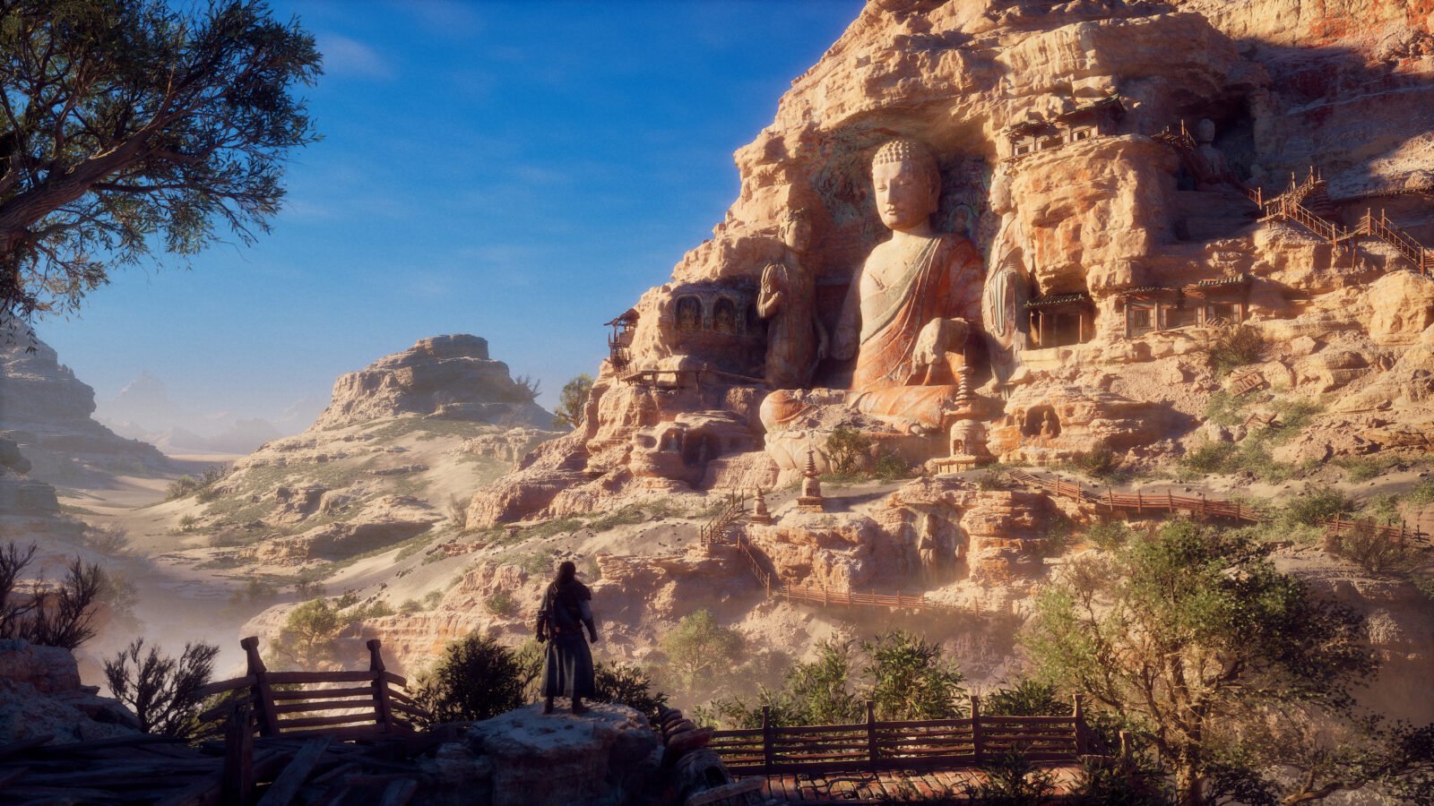 Protagonista observa estátua gigante esculpida em um penhasco no deserto.