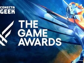 Troféu do The Game Awards em tons de azul e laranja, com o título em letras brancas.